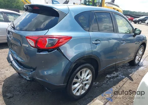 2015 Mazda Cx-5 Grand Touring z USA, uszkodzony, nr VIN JM3KE4DY5F0471689
